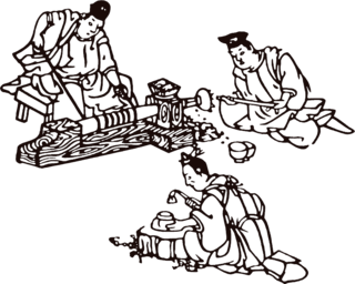 写真：轆轤を使い木地を作る様子